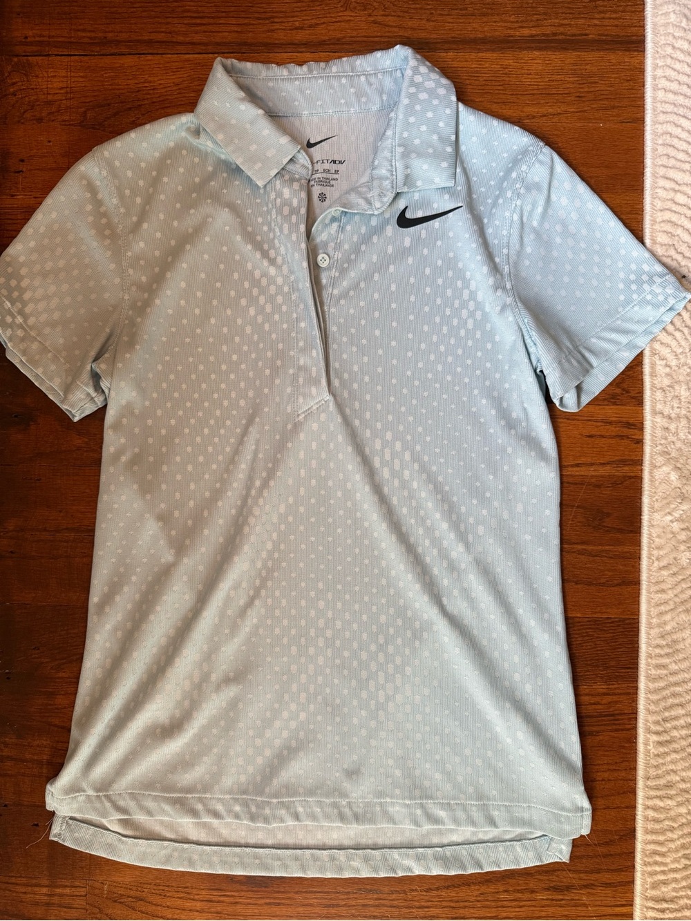 Nike Light Blue Polo Shirt with Subtle Dot Pattern